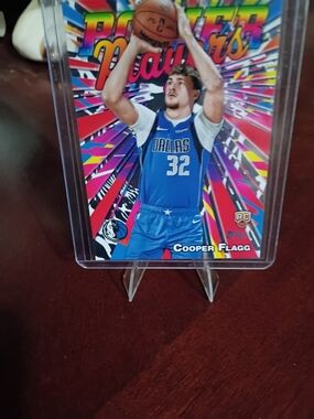 Topps Cooper Flagg Basketball Card with Blue Jersey and Multicolor Background